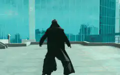 Man in trench coat throws another man