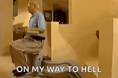 Old man on stairlift going down