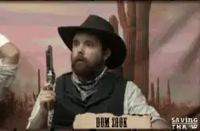 Dom Yook holding a gun