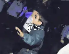 Kid dancing at club with Yes text