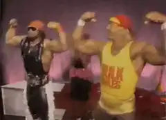 Hulk Hogan and Macho Man flexing