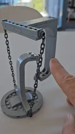 Grey Lego structure with chains