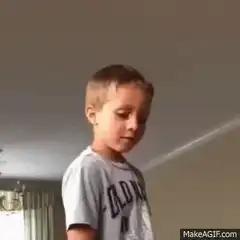 Boy looking back and smirking