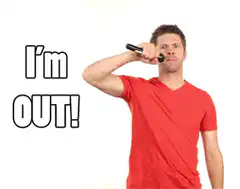 Man in red shirt holding a microphone saying I'm out