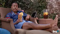 Man relaxing with a tropical drink