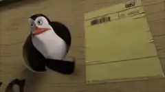 Penguin in cup with envelope