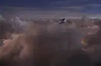 Angel flying over clouds