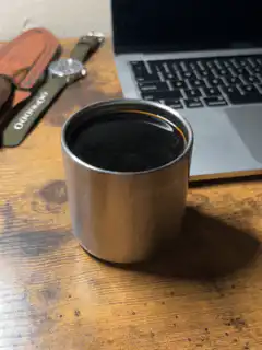 steam rising from coffee cup