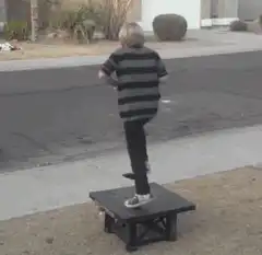 person falls off table