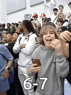 Boy excitedly gesturing with 6-7 text