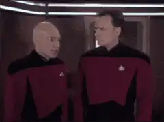 Picard and Riker hug