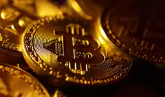 Golden Bitcoin coins close-up