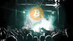 Bitcoin logo at a concert