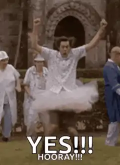 Man in tutu jumping with YES HOORAY