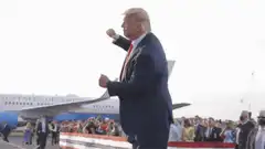 Donald Trump fist pumping on tarmac