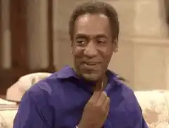 Bill Cosby touching his chin