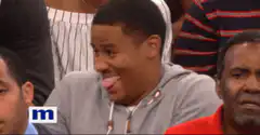 Man sticking tongue out and laughing