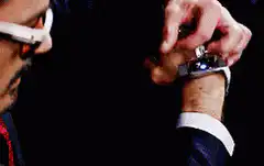 Tony Stark activates Iron Man gauntlet