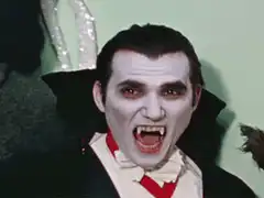 Count Dracula screaming with ghost overlay