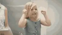 Excited toddler girl dancing
