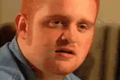 Man rolls eyes and looks away