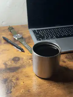 steam rising from coffee cup