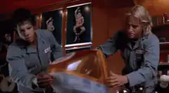 Han and Luke polish the Millennium Falcon