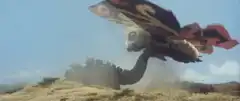Gamera fights a giant moth monster