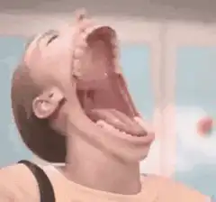 Girl yawning then laughing