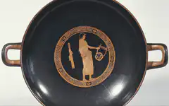 Ancient Greek vase zooming in on figure
