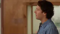 Man headbanging and falling over