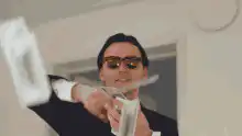 Man throwing money in the air