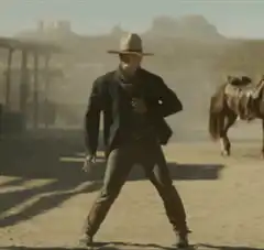 cowboy dancing in desert