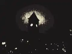 Spooky tower with glowing eyes