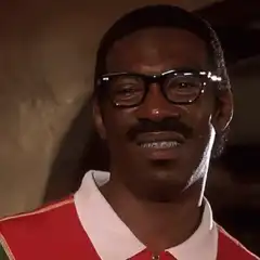 Eddie Murphy Smirking and Looking Up