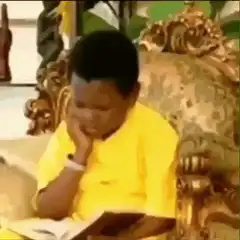 Young boy thinking and pointing