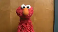 Elmo shrugging