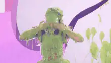 Kid covered in green slime