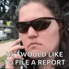 Woman on phone filing a report