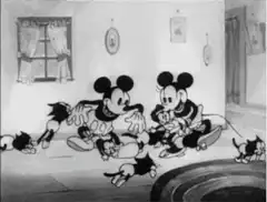 Mickey and Minnie Mouse with kittens