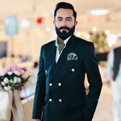 Man in green double-breasted suit