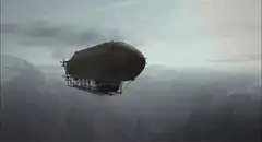 Airship flying over mountains