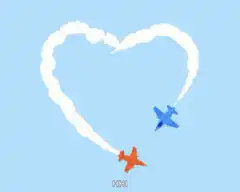 Two planes drawing a heart in the sky