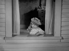 Baby throws something out window