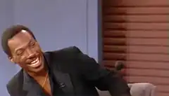 Eddie Murphy laughing hysterically