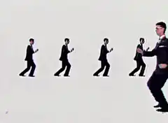 men in suits dancing