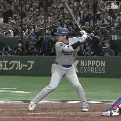 baseball player swinging bat