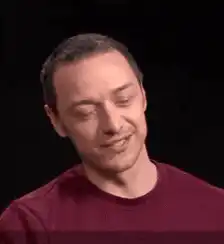 James McAvoy smirking and nodding