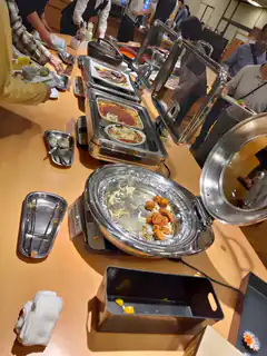 Japanese school lunch buffet with chafing dishes