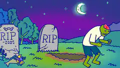Zombie rising from grave at night